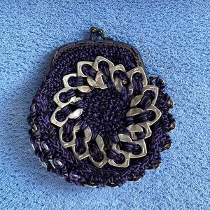 NWOT Soda pop coin purse.  Crocheted purple with silver ring pulls.